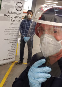 APC employees Lauritz David Jr. (left) and Nick Albert (right) inside the shop where they have produced over 30,000 face shields so far.